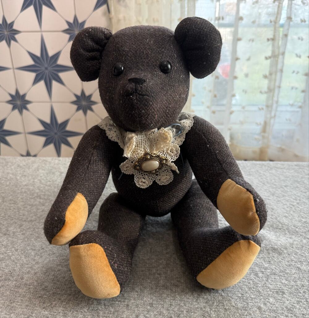 Handmade 16-inch wool teddy bear with poseable limbs and vintage lace collar.